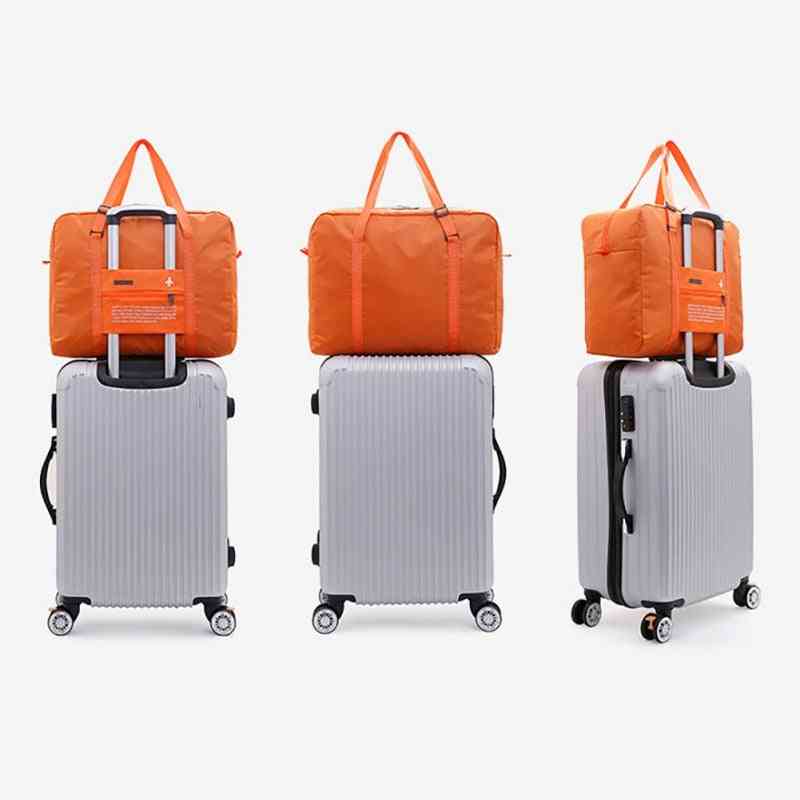 Cestovní taška na uložení zavazadel, pouzdro na rukojeti vozíku