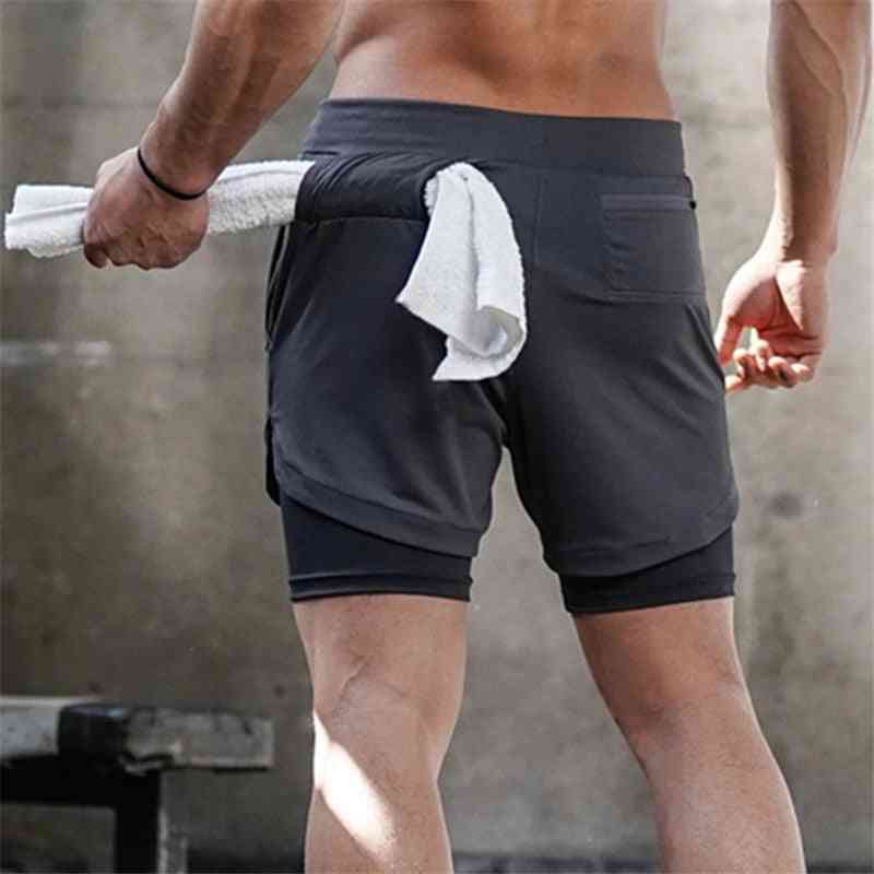 Dubbel-däck jogging springa gym träning shorts