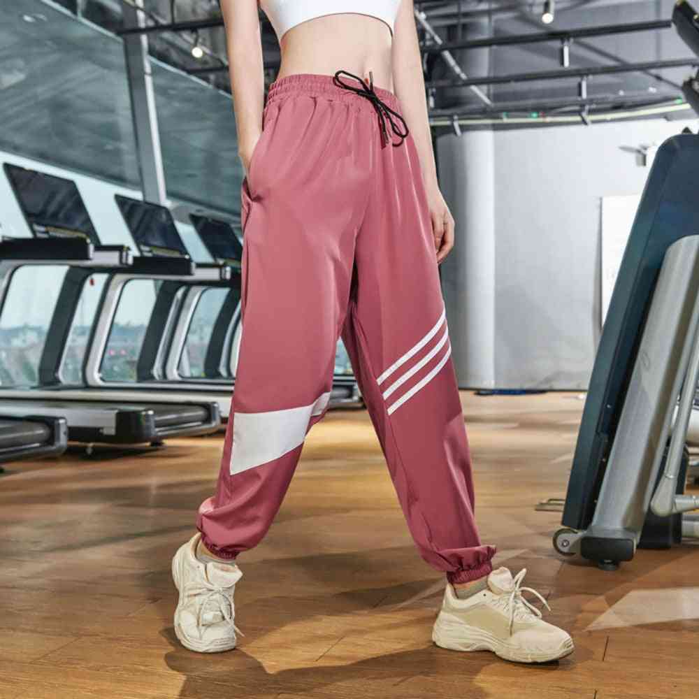 Pantalones de entrenamiento sueltos de ropa deportiva para mujer