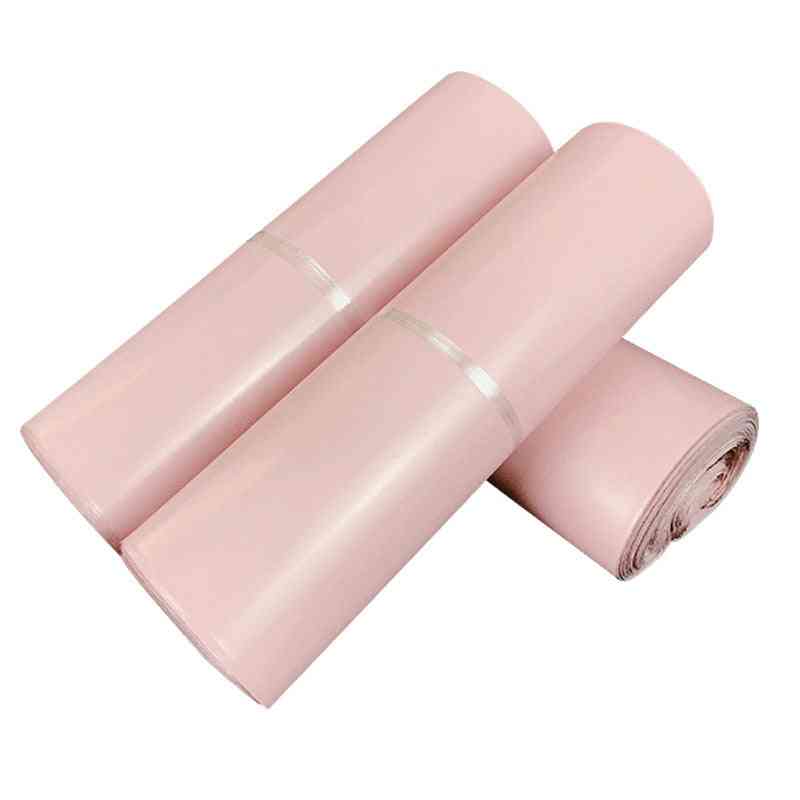 Halvány rózsaszínű poly postai műanyag szállító táskák, vízálló postai borítékok, önpecsét, posta, vastagabb futár