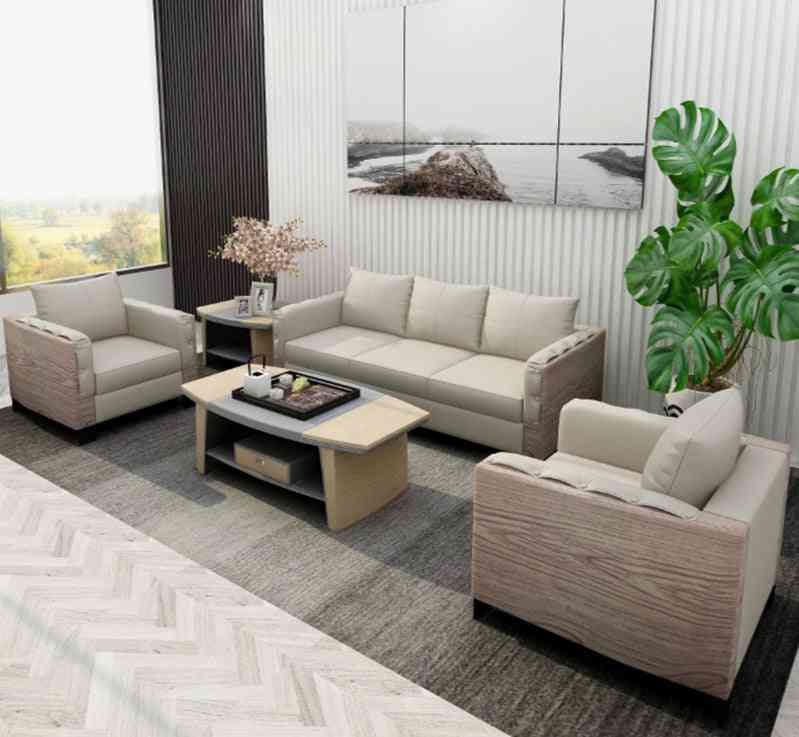 Elegantné moderné kožené sedenie, veľká pohovka, drevený konferenčný stolík do kancelárie, domov