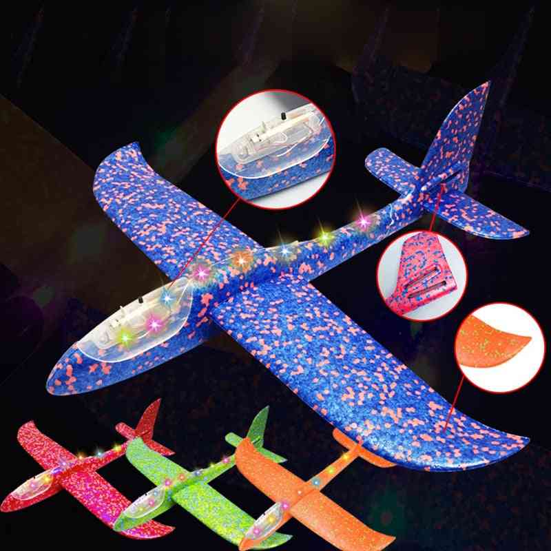 Kézi dobó hab forgó repülőgép modell játék és világító gép fény