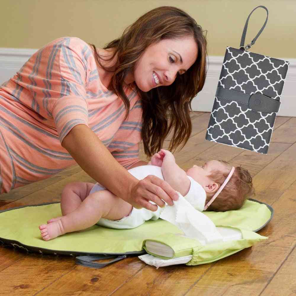 Vedenpitävä kannettava vauvan vaipan hoitoalusta