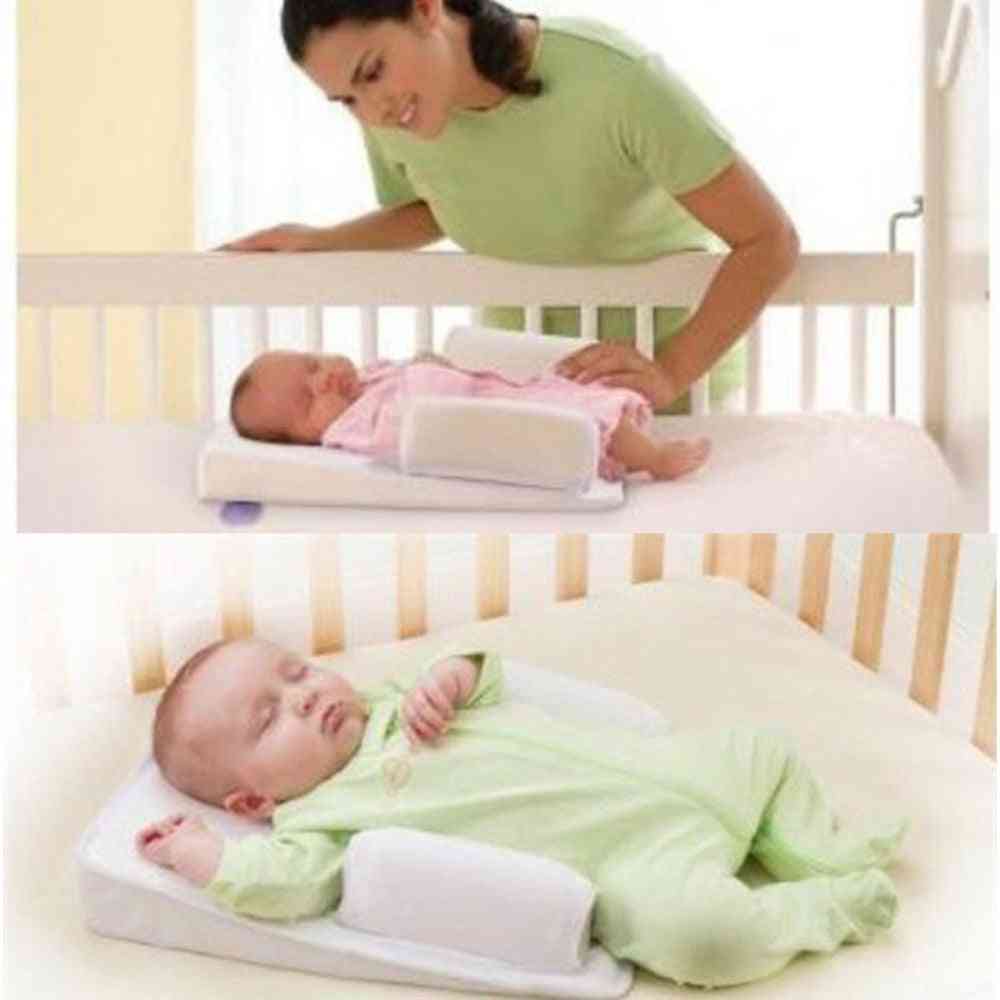 Polohovací polštář na spaní dítěte
