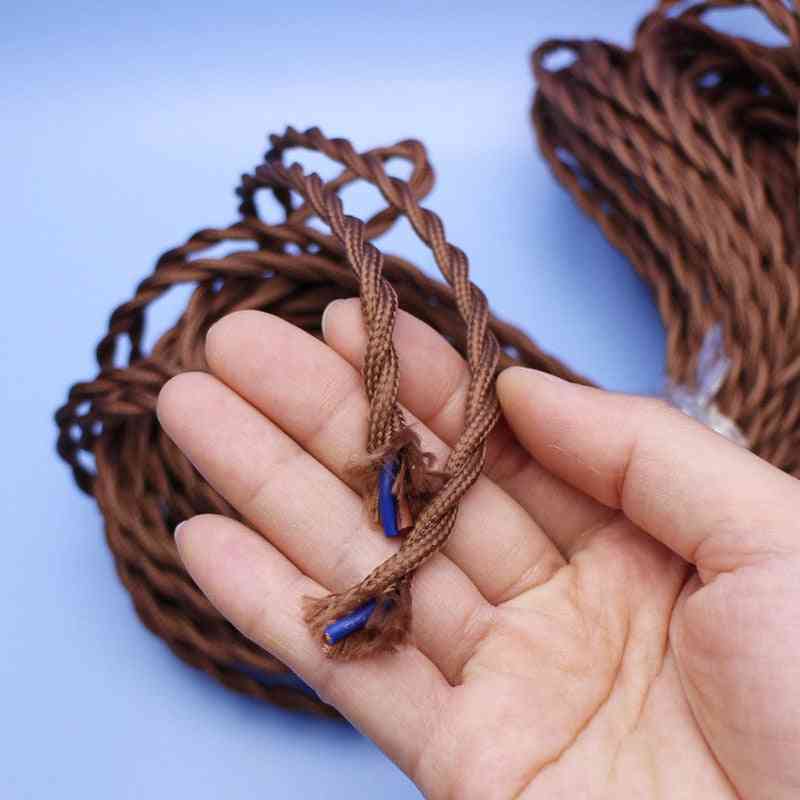 Hnědé starožitné textilní pletené kabely z tkaných tkanin