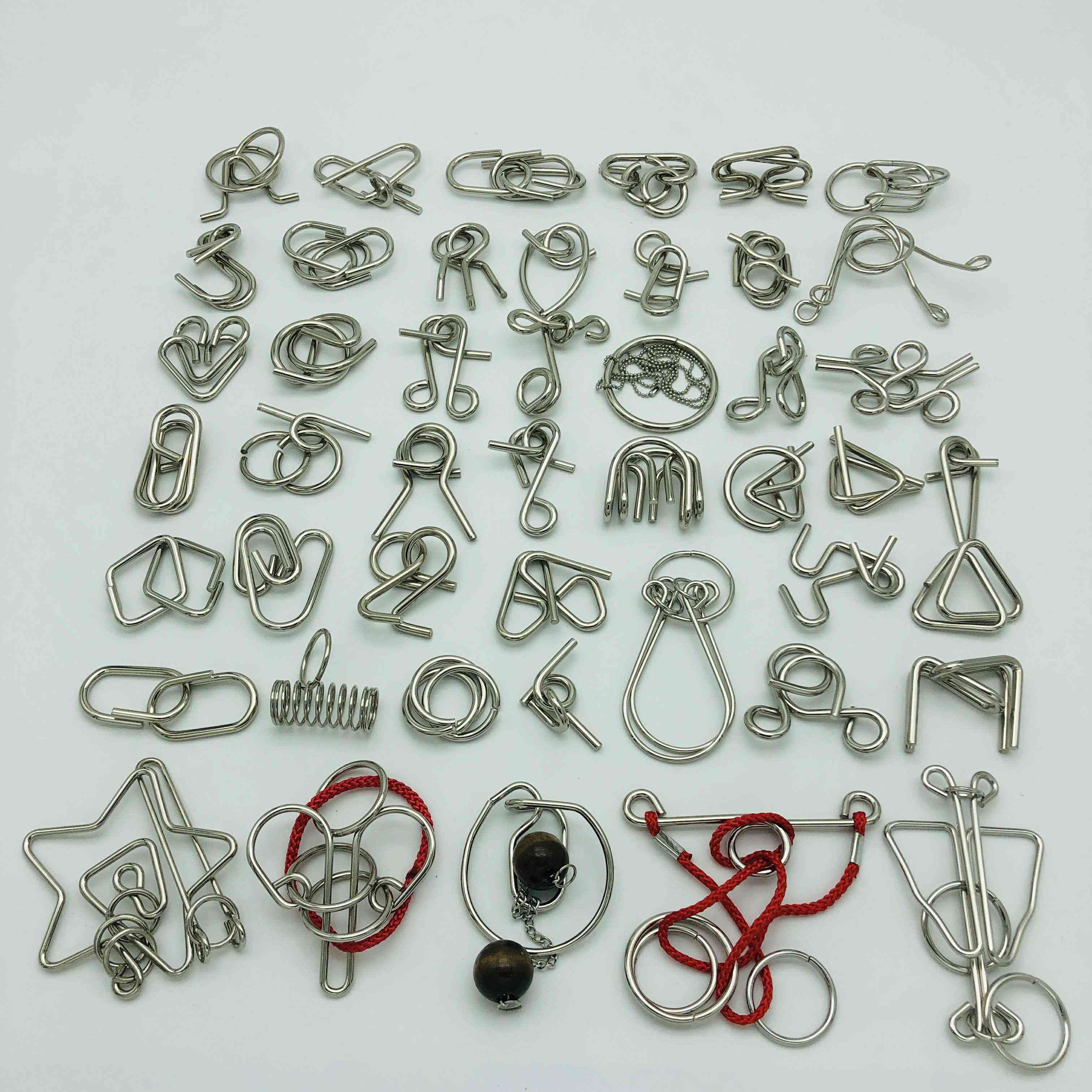 Metal Puzzle Mind Brain Teaser Magic Wire Rings Puzzles Game