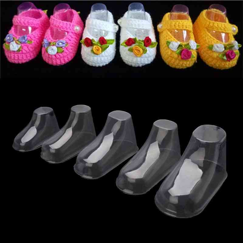 Clear Plastic Baby Feet Display