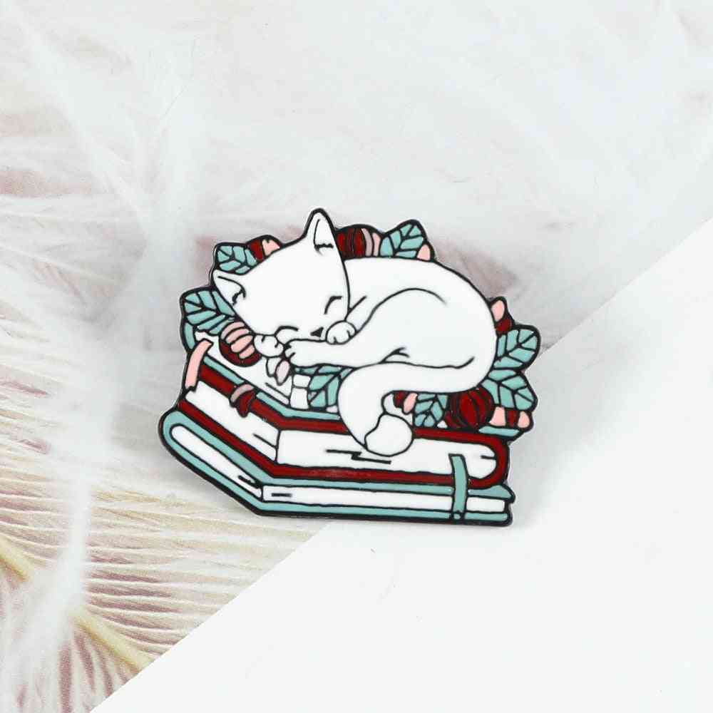 Cartoon Sleeping Kitten On Book Enamel Pin